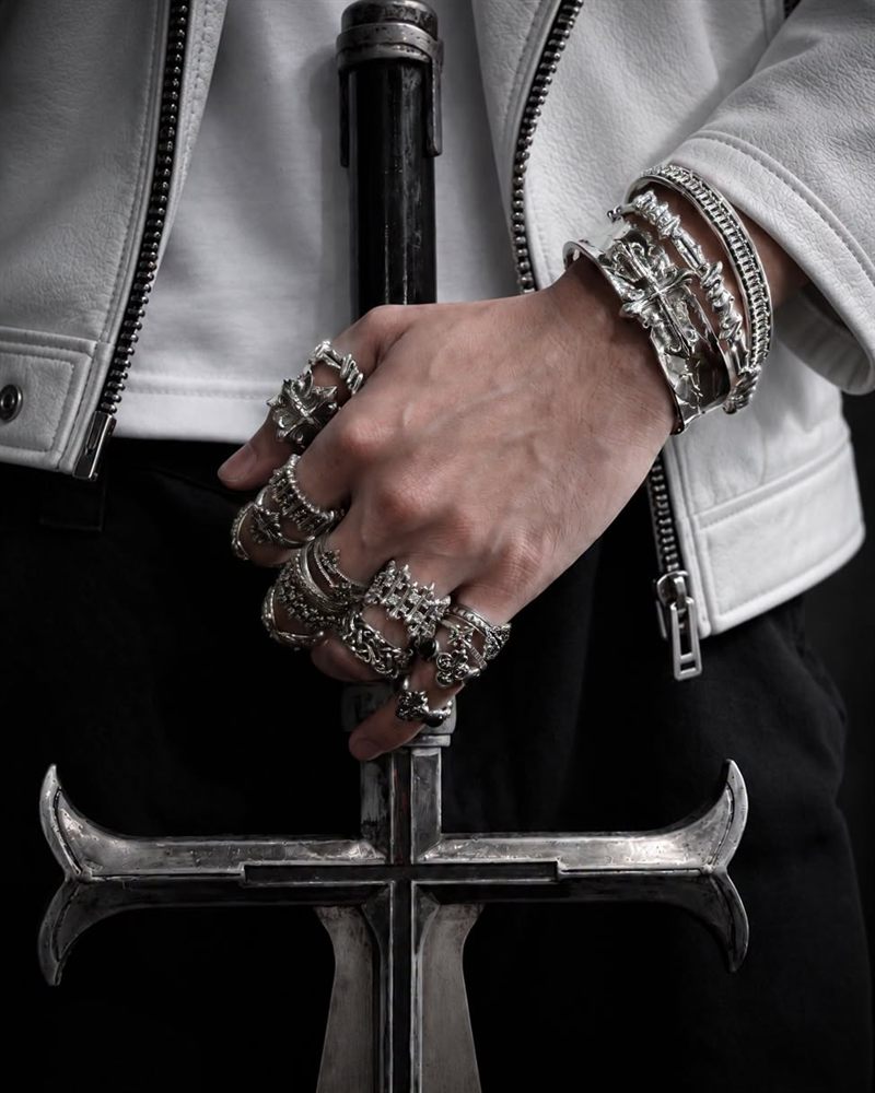AKE AKE jewellery styled with a sword and white jacket