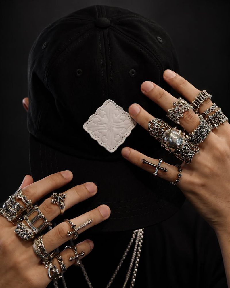 AKE AKE ring styling with a black signature cap
